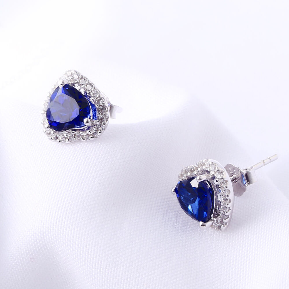 Success Earrings	- Sapphire Stud Earrings