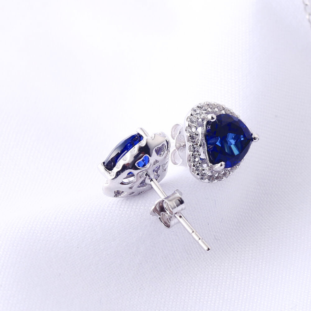 Success Earrings	- Sapphire Stud Earrings